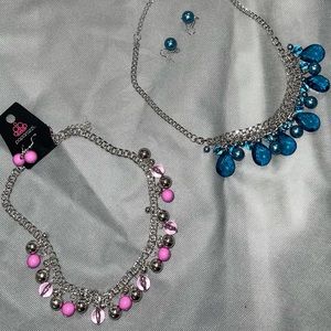 Paparazzi Jewelry. One blue and one pink/purple